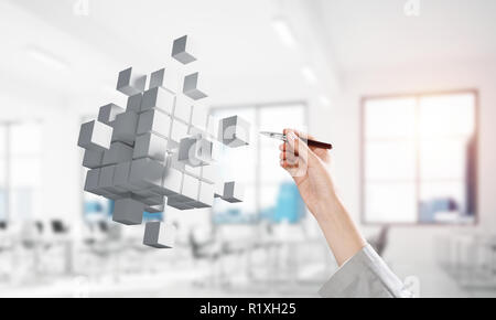 Integrating new technologies concept with cube figure floating i Stock Photo