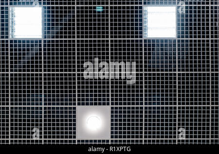 Grid structure of suspended ceiling in an mall building. Abstract modern architecture. Generic image of contemporary interior design. Geometric compos Stock Photo