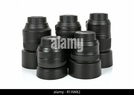 Group of professional and modern lenses for DSLR camera isolated on a white background in close-up Stock Photo