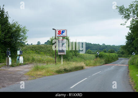 Abandoned Severn Fuels fuel filling station with derelict petrol pumps in Pembrokeshire, Wales, UK Stock Photo