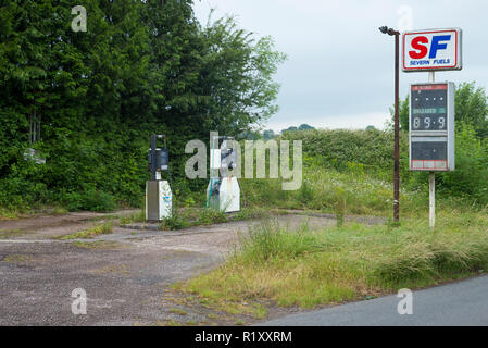 Abandoned Severn Fuels fuel filling station with derelict petrol pumps in Pembrokeshire, Wales, UK Stock Photo