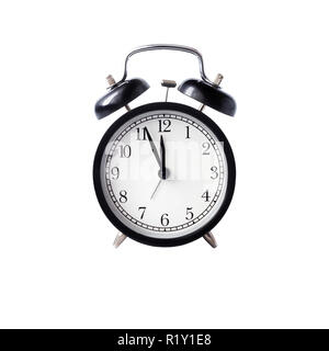black alarm clock with white dial  against white background isolated Stock Photo
