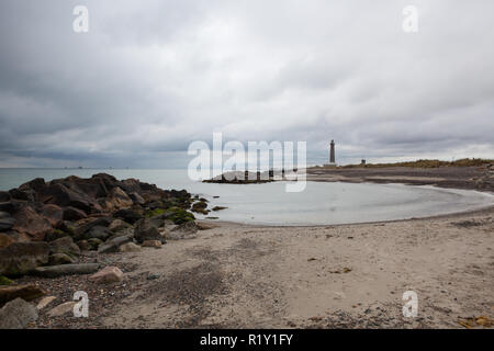 Skagen lighthouse in northern Denmark. The lighthouse was built in 1858 and with its 46m it is Denmarks second tallest. Place where the Baltic meets t Stock Photo