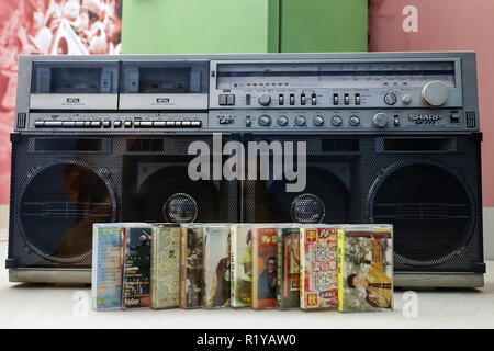 (181115) -- BEIJING, Nov. 15, 2018 (Xinhua) -- A vintage radio-recorder and several cassettes are displayed at a major exhibition to commemorate the 40th anniversary of China's reform and opening-up at the National Museum of China in Beijing, capital of China, Nov. 15, 2018. Vintage objects are displayed at the exhibition which opened here on Tuesday to show visitors the history, accomplishments, and experience of China's reform and opening-up. (Xinhua/Shen Bohan) (lmm) Stock Photo