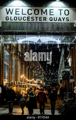 Gloucester, UK. 15th Nov 2018. Gloucesters historic market is a draw for visitors and locals. Stall holders dress up in victorian costume to provide a period atmosphere Credit: Mr Standfast/Alamy Live News Stock Photo
