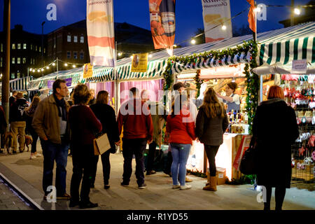 Gloucester, UK. 15th Nov 2018. Gloucesters historic market is a draw for visitors and locals. Stall holders dress up in victorian costume to provide a period atmosphere Credit: Mr Standfast/Alamy Live News Stock Photo