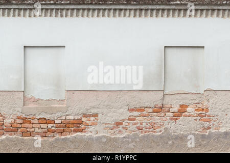 False windows on light green wall Stock Photo
