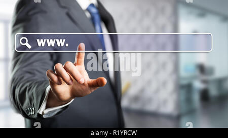 businessman touching search bar interface in front of an office scene Stock Photo