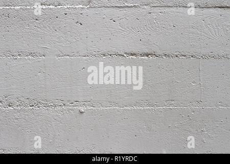 Grey concrete wall with the prints of the wooden mould Stock Photo