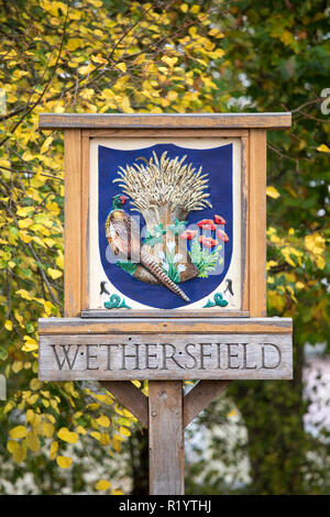 Old traditional village sign in typical quaint Wethersfield village in Essex, England, UK Stock Photo