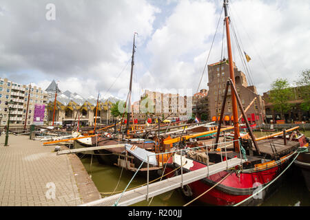 Rotterdam/Holland - May 15th 2013: boats in front of Rotterdam Cube houses Stock Photo