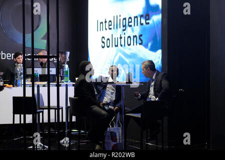 Tel Aviv, Israel 14 November 2018. Members of defense force of an unidentified African country speak to representative of the Israeli NSO Group which also goes by the name Q Cyber Technologies whose spyware called Pegasus enables the remote surveillance of smartphones at ISDEF 2018, an international defense and homeland security expo in Tel Aviv Israel showcasing an extensive array of innovative technologies in the fields of national security, intelligence, crowd protection, mass transit security, cybersecurity and financial tech Stock Photo