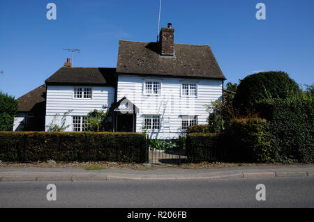 Pond Cottage, Essendon, Hertfordshire, is a white weather boarded building which was once the village post office. Stock Photo