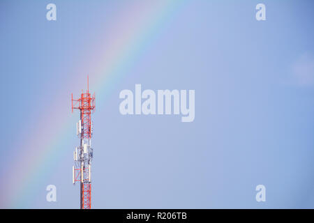 Telecommunication mast TV antennas wireless technology on blue sky background and copy space. Stock Photo