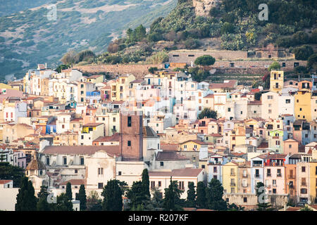 The beautiful village of Bosa with colored houses and a medieval castle on the top of the hill. Bosa is located in the north-west of Sardinia, Italy. Stock Photo