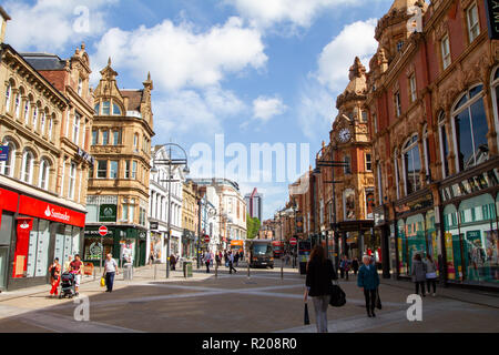 Leeds/England - May 16th 2014: Leeds City street on sunny day Stock Photo