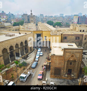 CAIRO, EGYPT - DECEMBER 21, 2017: Aerial view from Bab Zuwayla gate on Al Salih Tala'i mosque and Al Khayama street with Tentmakers covered market, Is Stock Photo