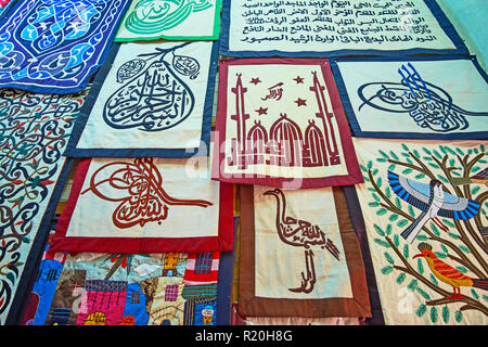 The stall of Tentmakers alley (Sharia Khayamiya) with fine examples of patchwork, embroidery, Arabic calligraphy in different shapes, Cairo, Egypt. Stock Photo