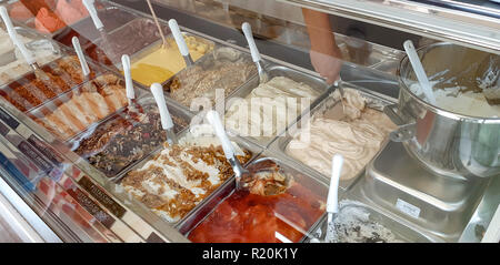 Different flavors of ice cream in a ice cream shop. Stock Photo