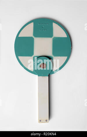 Cardboard plastic hand fan isolated on a white background Stock Photo