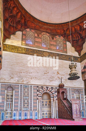 CAIRO, EGYPT - DECEMBER 21, 2017: The scenic interior of medieval Al-Nasir Muhammad Mosque of Saladin Citadel with muqarnas details around the dome an Stock Photo