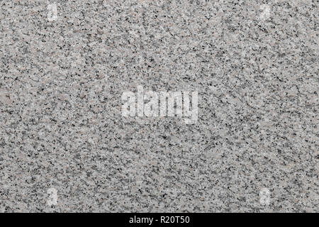 Polished variegated granite texture. It can be used as background. Stock Photo