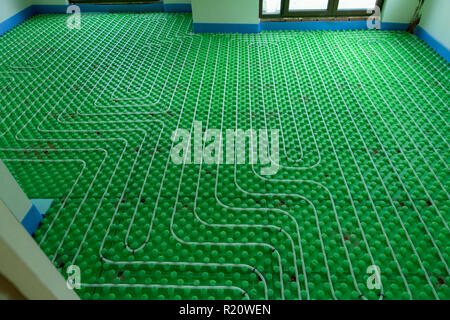 The floor heating system - new home installation Stock Photo