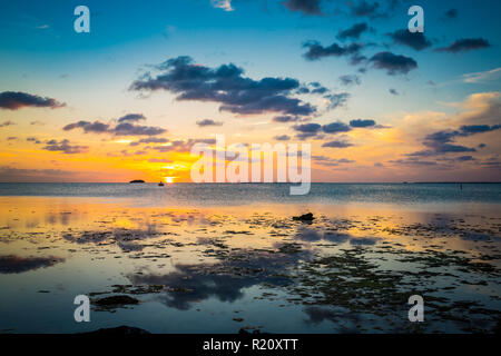 Sun slowly drops over key west water in Fl.jpg Stock Photo