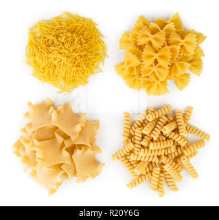 Set of four kinds of pasta on a white. The view from the top. Stock Photo