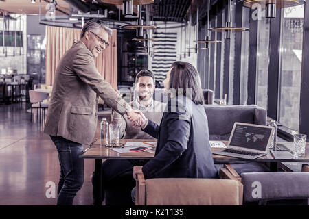 Successful business partners discussing their project and ideas Stock Photo