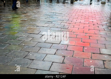 Wet pavement colourful reflections, Northumberland Street Newcastle Stock Photo