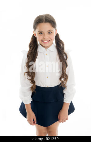 Cute and stylish. Gorgeous tails perfect for every day of week. Cute everyday back to school hairstyles. Schoolgirl happy smiling pupil long curly hair. Hairstyle for schoolgirl nice and easy. Stock Photo