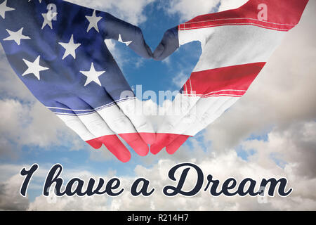 Composite image of usa flag painted on hands making heart shape Stock Photo