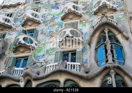 Barcelona, Spain - March 30, 2016: Casa Batllo building facade closeup. Gaudi design. Modernist architecture and style. Landmark and sightseeing. Summer vacation and wanderlust. Stock Photo