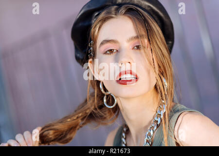 Young appealing photo model with light pink eye shades and bright lips Stock Photo