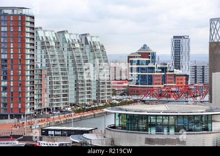 MANCHESTER, UK - APRIL 22, 2013: Salford Quays in Manchester, UK. Greater Manchester is the 2nd biggest population centre in the UK with 2,553,379 peo Stock Photo