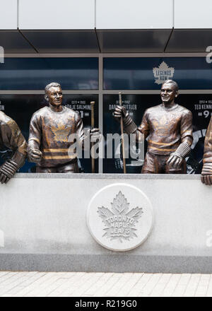 Statues of Toronto Maple Leafs ice hockey players pictured outside the Air Canada Centre.  The center has since been renamed the Scotiabank Arena. Stock Photo