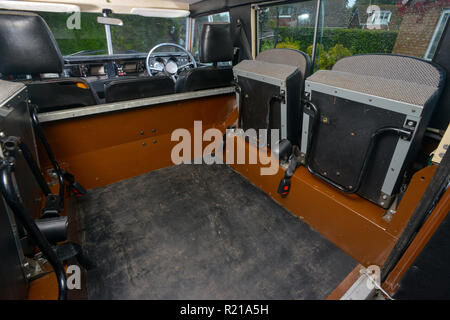 side facing rear seats in a 1983 Series 3 Land Rover 88' County classic British 4x4 car Stock Photo