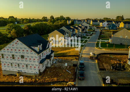 Aerial shot of American luxury upper middle class single family home real estate neighborhood in the East Coast under construction Stock Photo