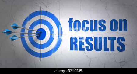 Business concept: target and Focus on RESULTS on wall background Stock Photo