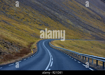winding road with mountaind view on hvalfjordur fjord in iceland Stock Photo