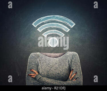 Surreal image young woman crossed armss and wifi symbol instead of head drawn over blackboard background. Dreaming of better network, excellent signal Stock Photo