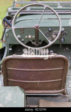 Steering wheel and dashboard of a Willys jeep on display at military vehicle show in the grounds of Durham Light Infantry Museum, Stock Photo