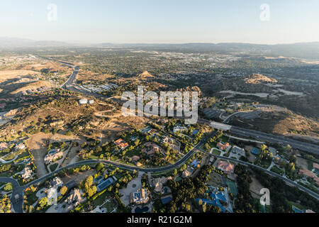 Late afternoon aerial view of mansions, condos along the 118 freeway in the Chatsworth neighborhood of Los Angeles, California. Stock Photo