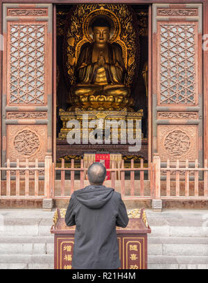 Worshipper at Big Wild Goose Pagoda in Xian Stock Photo