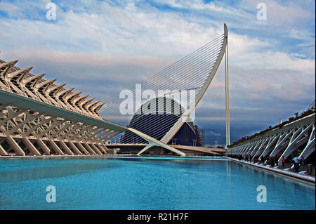 View of El Pont suspension bridge , Oceanografic building and museum of sciences from the water pool at the Art of Sciences, Valencia, Spain Stock Photo