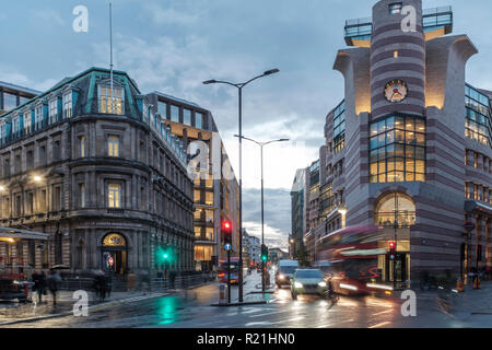 England,London- traffic on Bank Station Junction, City of London Magistrate Court to the left, Queen Victoria Street and Poultry to the right Stock Photo