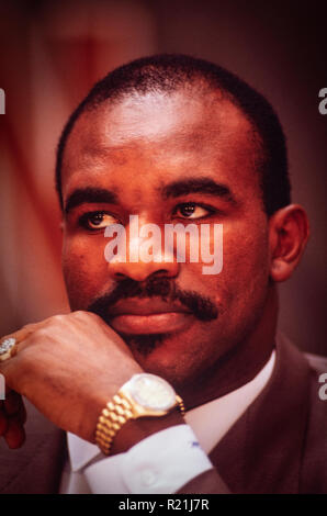 Evander Holyfield during a press conference in Atlanta in 1991 announcing his match against George Foreman. Holyfield is an American former professional boxer who competed from 1984 to 2011. He reigned as the undisputed champion at cruiserweight in the late 1980s and at heavyweight in the early 1990s, and remains the only boxer in history to win the undisputed championship in two weight classes. Nicknamed 'The Real Deal', Holyfield is the only four-time world heavyweight champion, having held the unified WBA, WBC and IBF titles from 1990 to 1992. Stock Photo