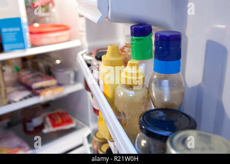 mini fridge full of bottled water isolated on white Stock Photo - Alamy