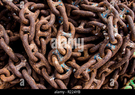 Old rusted  chains with cracked paint Stock Photo